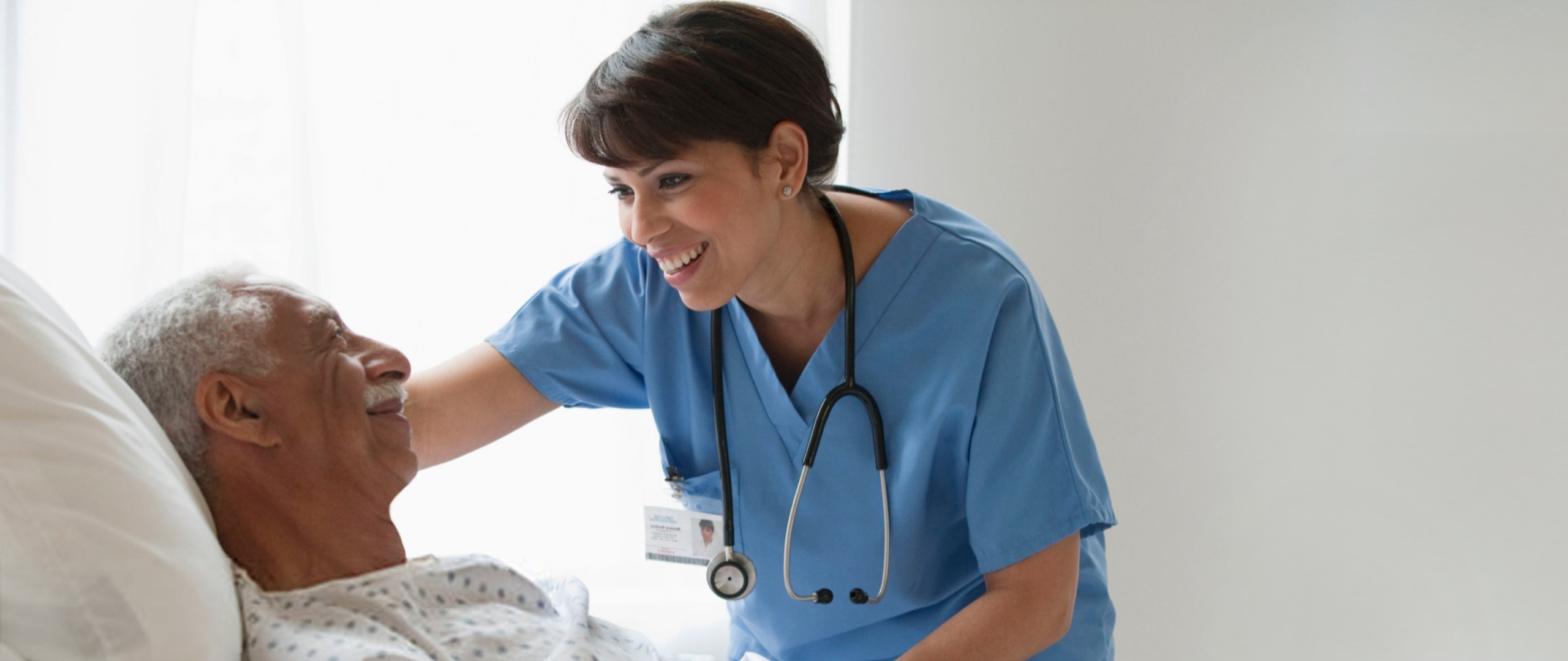 Nurse with elderly male patient